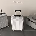 Three Modern Hard Shell Suitcases in Silver White Gray with Spinner Wheels and Telescopic Handles