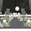 Banquet Hall with Green Curtains White Carpet and Fresh Flower Decorations