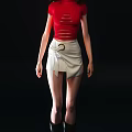 Woman in Red Ripped Top and White Skirt with Gold Ring Belt on Black Background