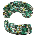 Stylish Curved Sectional Sofa With Colorful Jungle Print And Green Accent Cushions