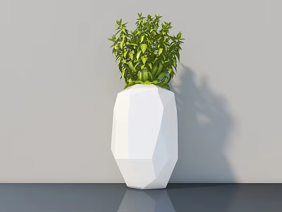 Green Leafy Potted Plant In White Polyhedral Vase On Dark Countertop With Gray Wall 3d model