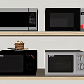 Various Modern Kitchen Appliances Microwave Oven and Baking Oven with Waffles on Shelf