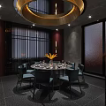 Modern Private Dining Room With Round Table Black Chairs Golden Pendant Light And Decorative Flowers