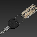 Metal Car Key with Black Head and RV Shaped Keychain on Key Ring
