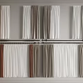 Various Colored Curtains Display with Modern Rods and Different Textures on Wall