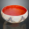 Artistic Hand Carved Bowl With Red Interior And Geometric Exterior Patterns