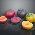 Fresh Red Yellow Purple Peaches And Plums With Green Leaves Whole And Sliced