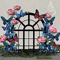 Decorative Window Display With Pink Roses Blue And Pink Butterflies Arched Frame And Green Grass