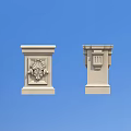 Decorative Columns With Intricate Carvings And Classic Capital Design Against Blue Sky Background