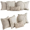 Neutral Knitted Round Pillow With Pom Pom Edges And Woven Textured Square Pillows
