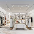 Modern Clothing Store Interior With Clothing Racks Display Table And Track Lighting