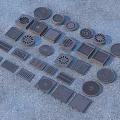 Essential Household Drain Covers With Various Shapes And Designs On Gray Ground