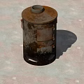 Rusty Metal Stove With Top Opening Side Handles And Vent Holes