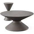 Two Modern Round Gray Coffee Tables With Speckled Texture And Conical Bases 3d model
