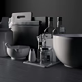Minimalist Gray Kitchenware Collection Including Canisters Bowls And Spice Jars On Dark Countertop