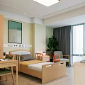 Hotel Guest Room Interior With Wooden Bed Wall Artwork Window Plant Armchair And Nightstand