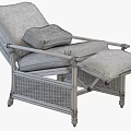 Comfortable White Cushioned Lounge Chair With Black Wicker Frame And Ottoman