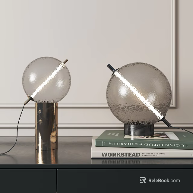 Spherical Glass Table Lamps with Metal Bases Illuminated One on Desk and One on Books 3d model 