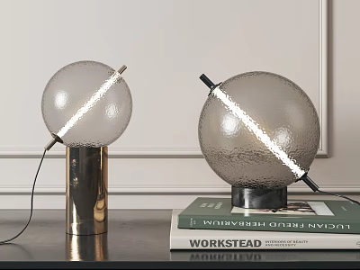 Spherical Glass Table Lamps with Metal Bases Illuminated One on Desk and One on Books 3d model