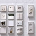 Various Modern Switch Panels With Different Designs Displayed On White Wall 3d model