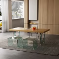 Modern Wooden Dining Table Set with Transparent Glass Stools and Fruits near Wooden Wall Fireplace