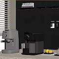 Stylish Coffee Machines on Kitchen Counter with Silver Black Design and Fresh Lemons Near Window