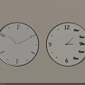 Two Wall Clocks Featuring Arabic Numerals and Time Themed Text on Beige Wall 3d model