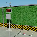 Construction Site Green Fence With Yellow Warning Stripes And Monitoring Device