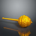 Golden Carved Ceremonial Weapon With Long Handle And Shiny Surface