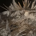 Spiky Rock Terrain With Gravel Surface And Irregular Crystalline Structures Against Dark Background