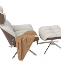 Modern Recliner Chair With White Brown Upholstery Matching Ottoman Brown Blanket Metal Base