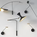 Stylish Modern Wall Lamps Featuring Curved Arms Round Bases And Gold Accents
