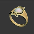 Elegant Gold Ring Featuring Oval Opal With Pearly Luster and Intricate Gold Decorative Details