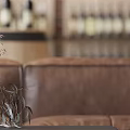 Industrial Style Restaurant Interior With Brick Walls Pendant Lights And Comfortable Seating