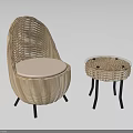 Woven Rattan Outdoor Chair with Cushioned Seat and Matching Side Table Black Legs