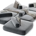 Modern Sectional Sofa in Neutral Tones with Pillows and Cozy Throws for Comfort