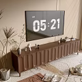 Brown TV Stand with TV and Decorative Ornaments Nearby Plant and Rug in Living Room