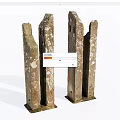 Pair of Weathered Stone Columns With Historic Patina And Textured Surfaces