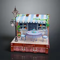 Miniature Café Scene On Trunk Base With Striped Awning Table Chairs Street Lamp And Plants
