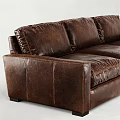 Classic Brown Leather Three-Seater Sofa With Distressed Texture And Comfortable Living Room Design