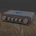 Modern Digital Audio Device With Blue Brown Design Knobs And Top Button On Wooden Table 3d model
