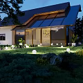 Elegant Detached Villa Night View With Glass Design Lush Greenery And Garden Lighting
