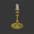 Brass Candlestick With White Candle On Black Background And Ornate Base