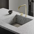 Modern Grey Stone Washbasin Interior With Brass Faucet And Small Decorative Bowl