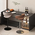 Modern Bar Counter With Black Countertop Beige Brown Stools Fruits Wine Glasses And Glass Cabinet