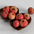 Fresh Ripe Pomegranates In Heart Shaped Wooden Bowl And One Extra On White Background