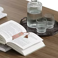 Decorative Ornament Combination With Books Eyeglasses Newspaper Tray Glass Bottle And Cups On Wooden Table