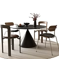 Black Round Dining Table Set With Four Wooden Metal Legged Chairs Vase Flowers Fruit Bowl