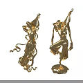 Elegant Golden Character Statues In Dancing Poses Holding Lutes With Flowing Ribbons