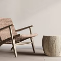 Natural Leisure Chair With Wicker Seat And Backrest And Wooden Frame Alongside Wooden Round Stool